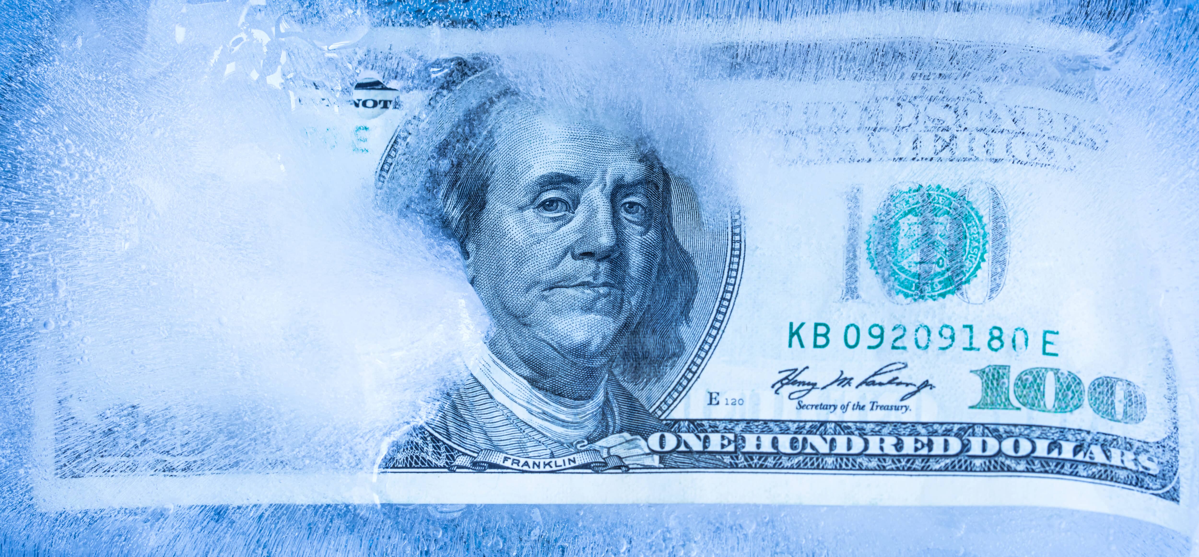 One hundred Dollar Bill inside Ice
